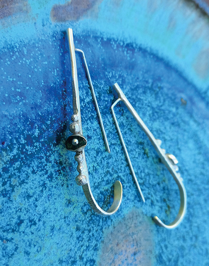 Boucles d'oreilles fabriquées par Oraj